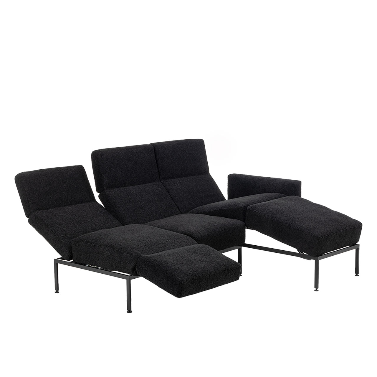 Garnitur brühl roro medium spring 73906 + 73920 Eckgarnitur der Serie roro medium spring mit Relaxliege links und Anstellsofa rechts in schwarzem Stoff.