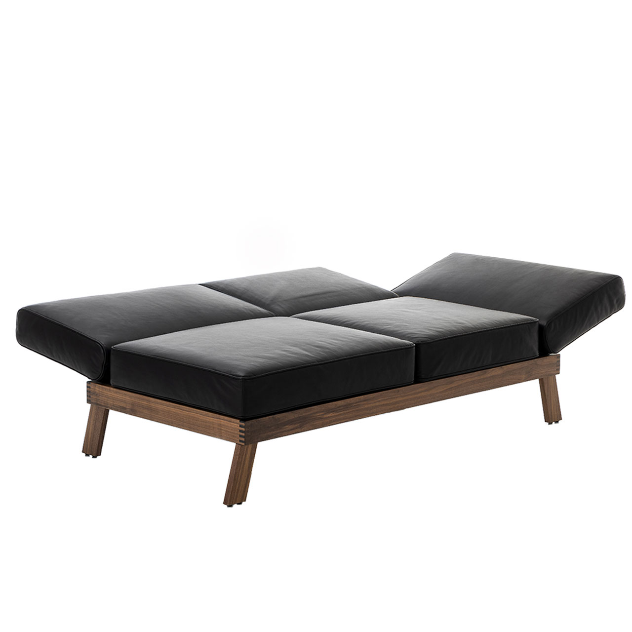 brühl lofoten lounge - Openend 73420 Openend der Serie brühl lofoten Lounge in schwarzem Leder. Das Untergestell ist in Eiche dunkel. Armlehne und die Rückenlehnen sind vollständig waagrecht abgesenkt.