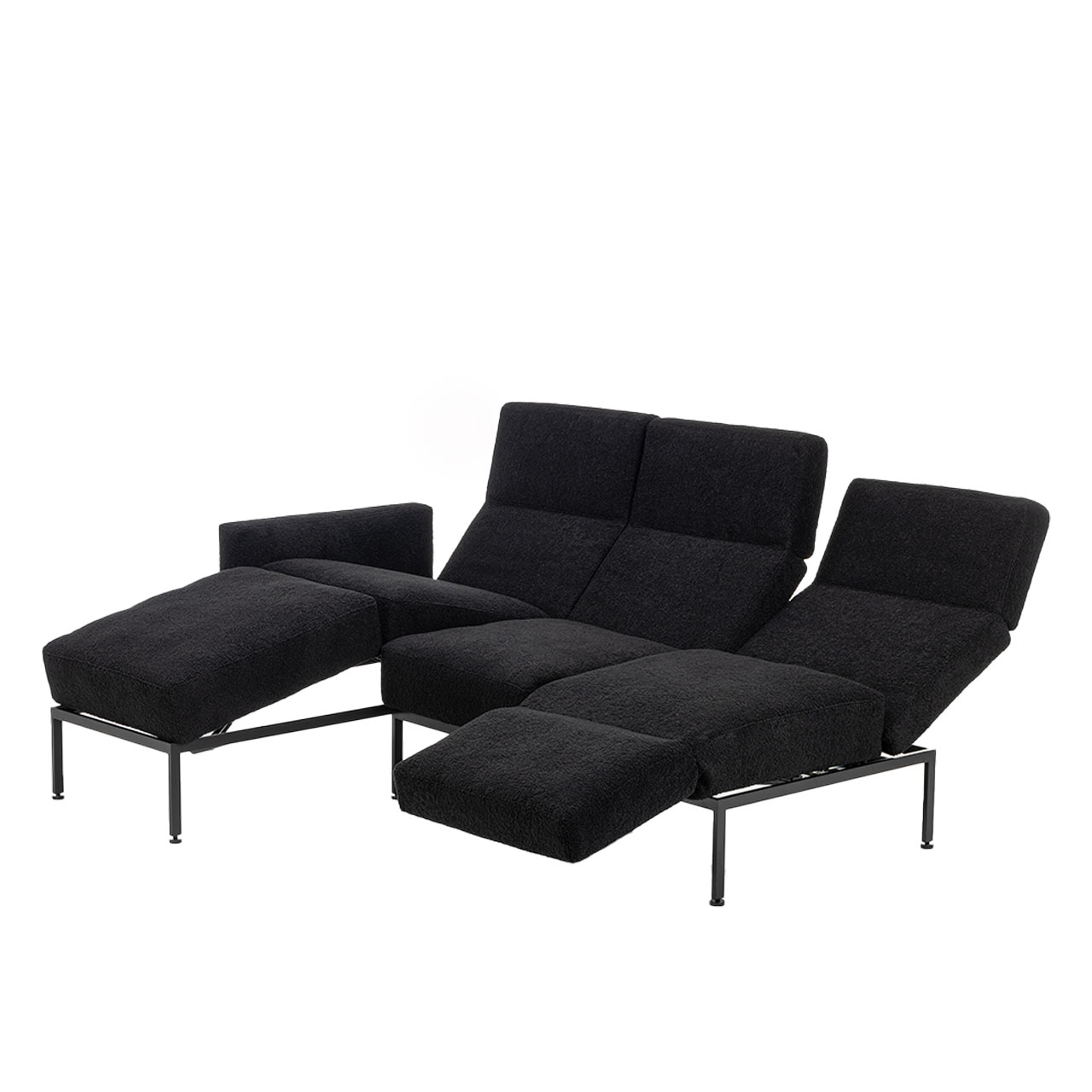 Garnitur brühl roro medium spring 73920 + 73907 Eckgarnitur der Serie roro medium spring mit Relaxliege rechts und Anstellsofa links in schwarzem Stoff.